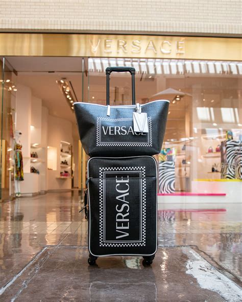 versace suitcase blue|versace shoulder bag men.